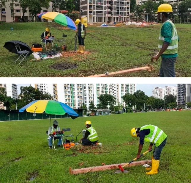 Workers hammering to generate waves from the seismic source for Downhole Seismic Test