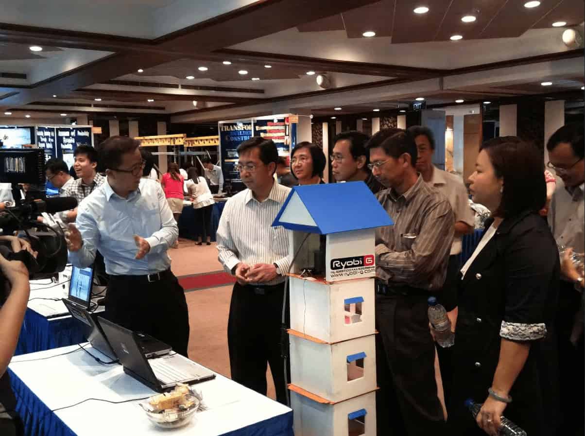 Ryobi-G's CEO giving demonstration to visitors during exhibition
